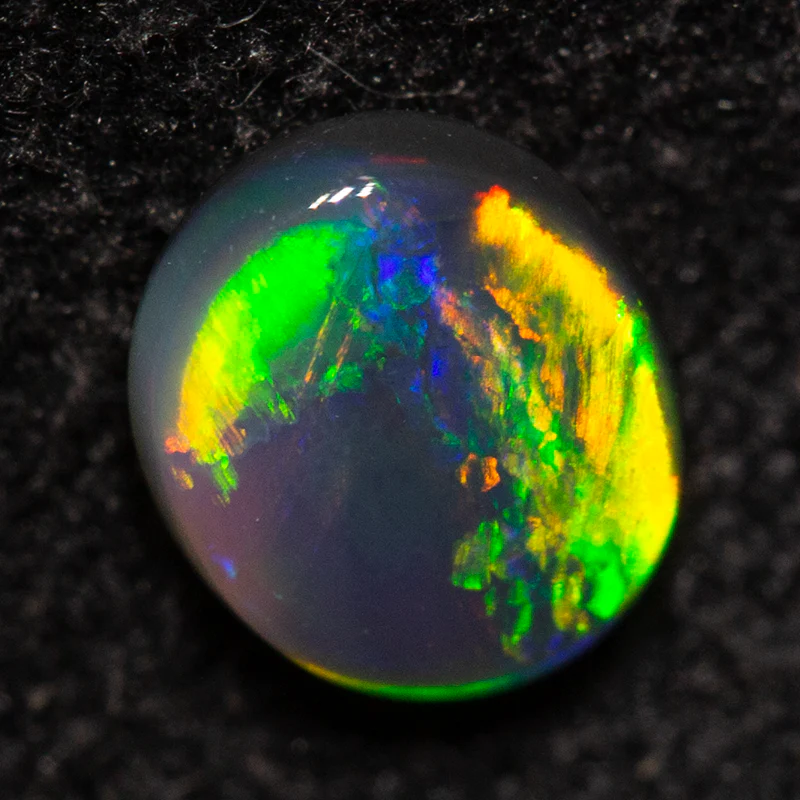 0.34 ct black opal 5.4x4.5x2.2mm