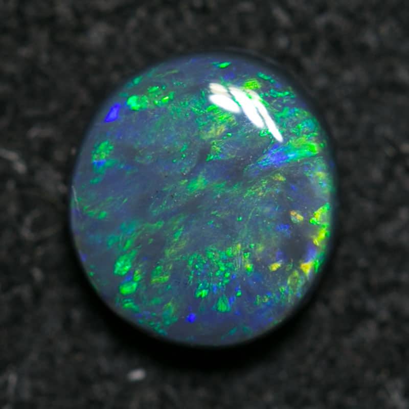 0.34 ct black opal 5x4.5x2mm