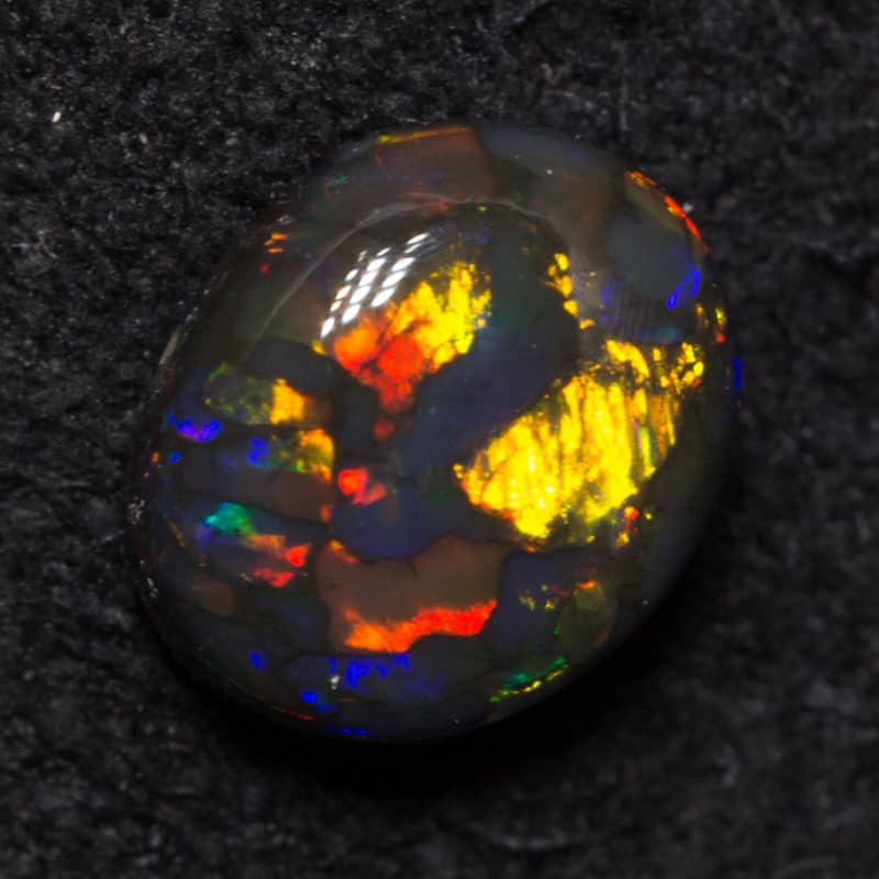 0.36 ct black opal 5.3x4.5x2mm