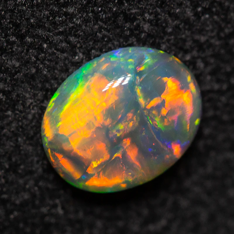 0.38 ct dark opal 5.9x4.9x2mm