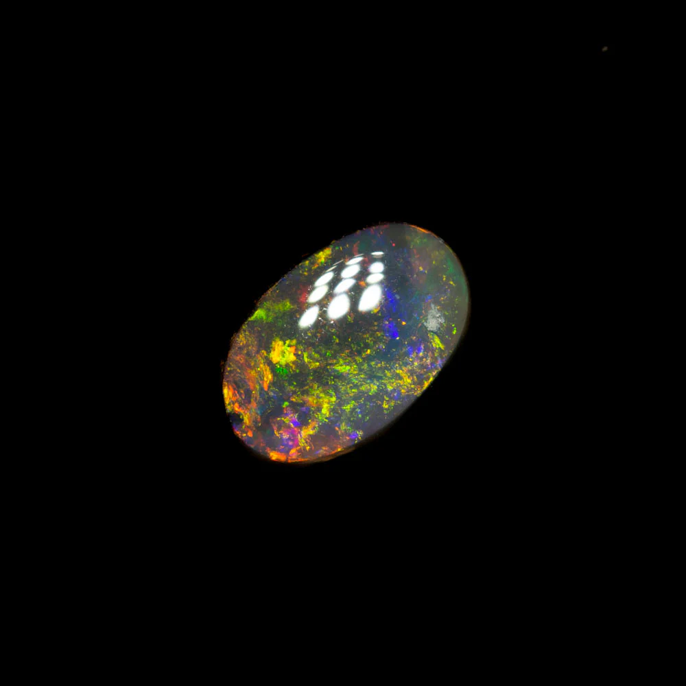 0.41 ct dark opal 6.2x4.1x2.2mm