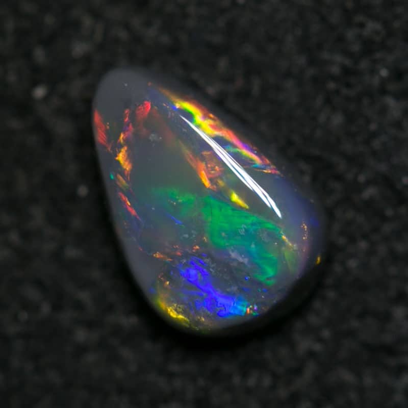 0.42 ct black opal 6x4x2mm