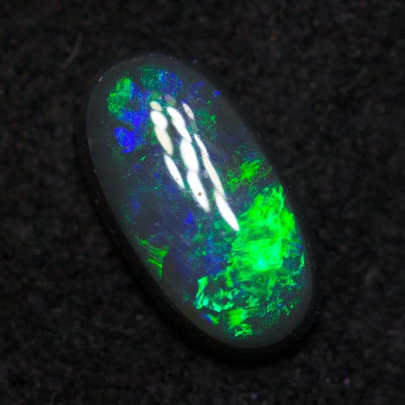 0.44 ct black opal 7x4x2.5mm