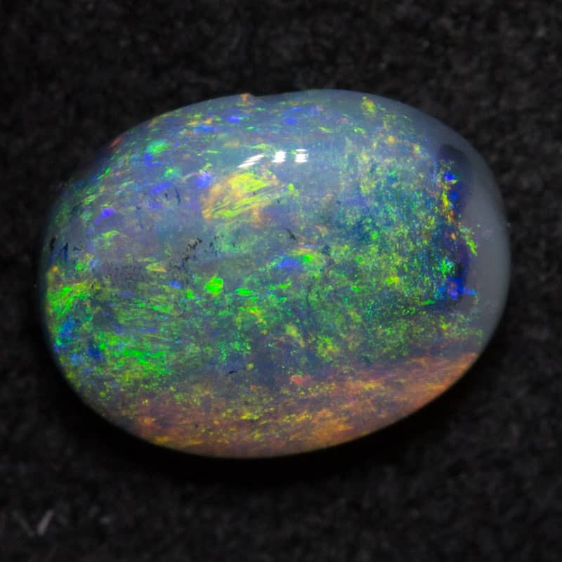 0.46 ct dark opal 5.9x4.4x2.7mm