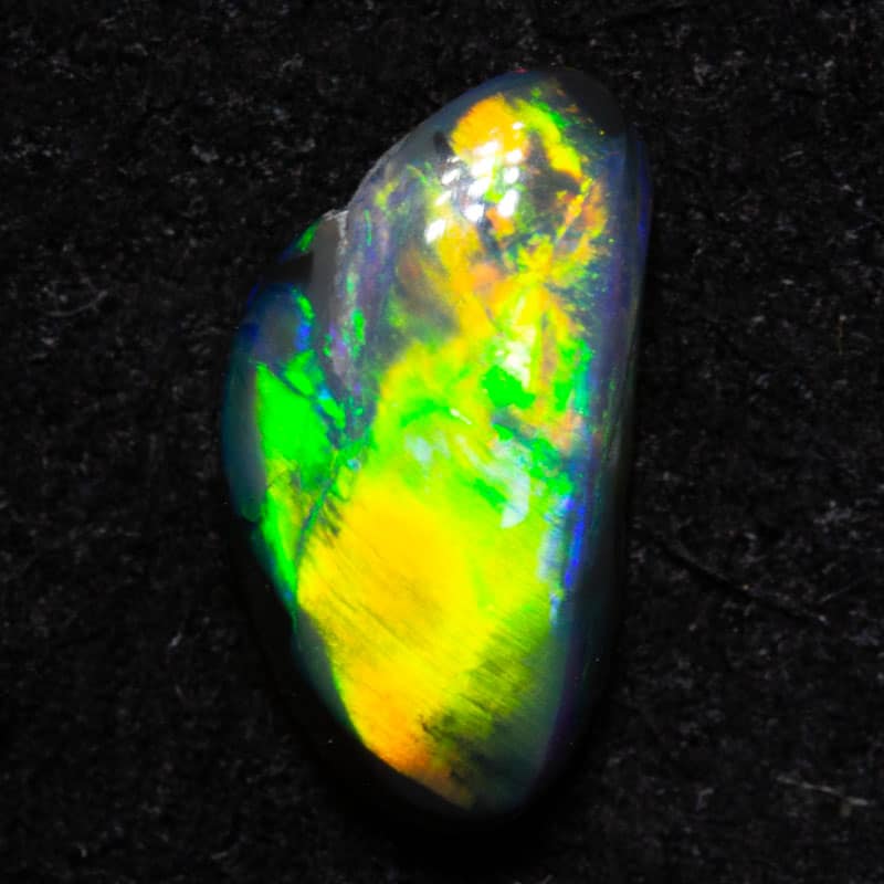 0.49 ct black opal 7.6x4.1x2.4mm