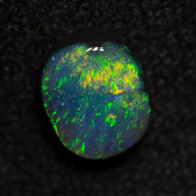 0.50 ct dark opal 5.6x4.7x2.4mm