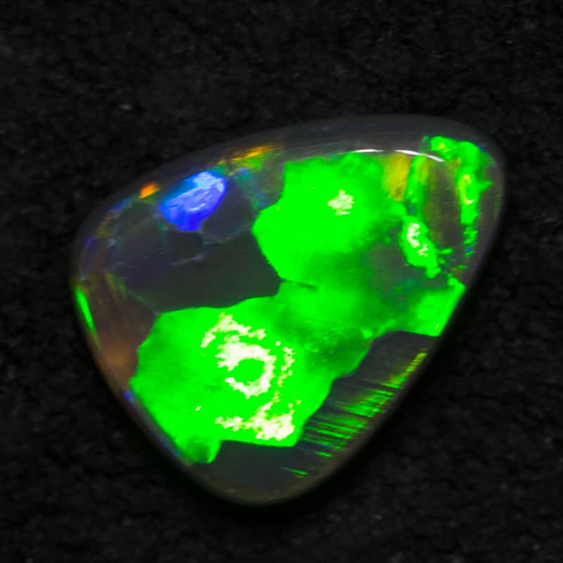 0.54 ct black opal drop gem 7x5x2mm