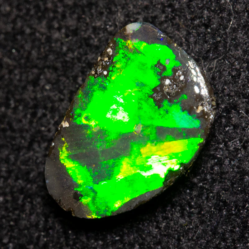 0.55 ct boulder opal 7.3x5.1x2.2mm