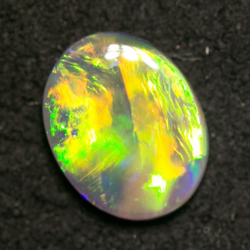 0.55 ct dark opal 7x6x2mm