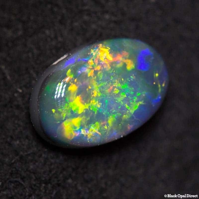 0.59 ct black opal 7x4.5x2mm
