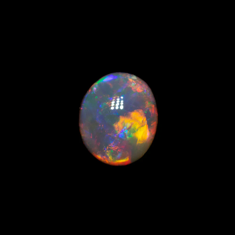 0.63 ct gem dark opal 5.7x5x3.4mm
