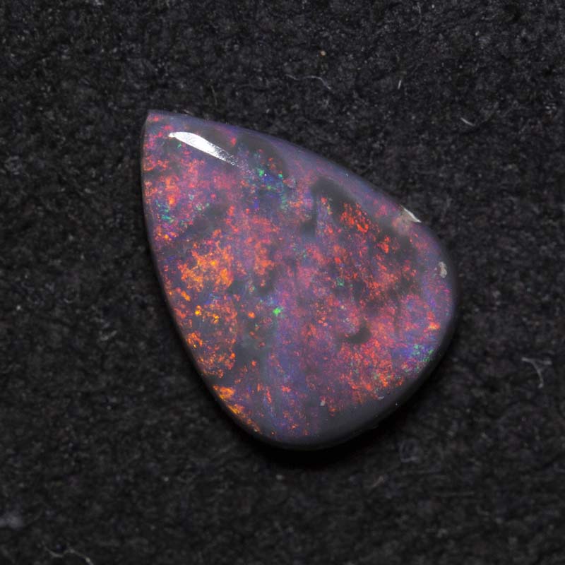 0.64 ct black opal 8.1x5.7x2.2mm