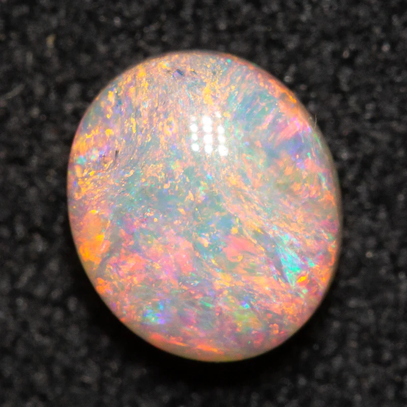0.64 ct white opal 6x5.1x3.2mm