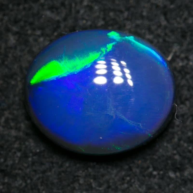 0.66 ct black opal 6x5x2.5mm