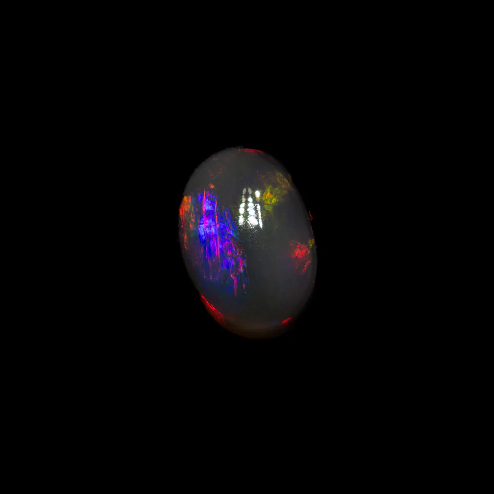 0.68 ct black opal 6.3x4.7x3.2mm