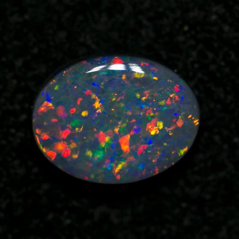 0.68 ct dark opal 7x5.5x2mm