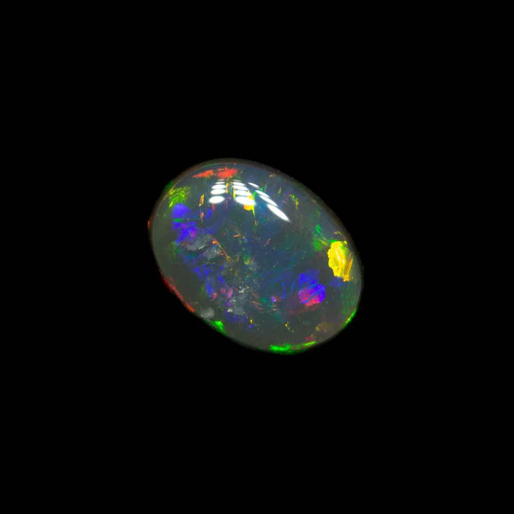 0.69 ct double-sided black opal 6.9x5.2x2.7mm - Image 2