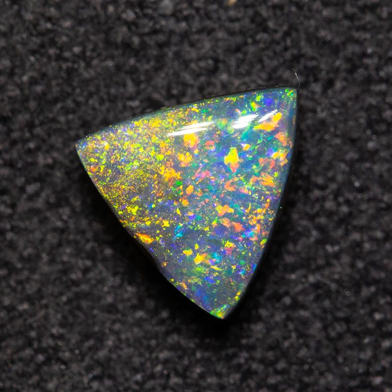 0.70 ct boulder opal 5.8x5.5x3.3mm