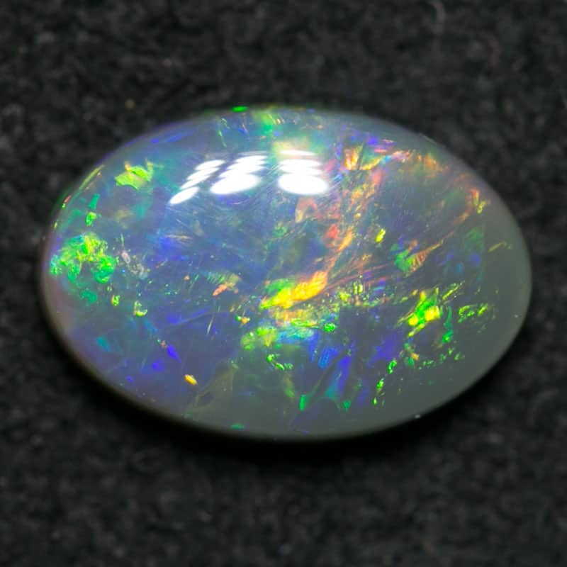 0.72 ct dark opal 7.5x5x2mm