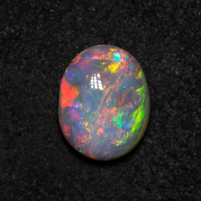 0.72 ct dark opal 7x5.5x3.1mm