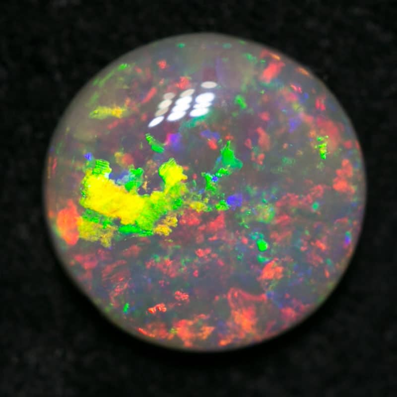 0.74 ct crystal opal 7mm round x 2mm