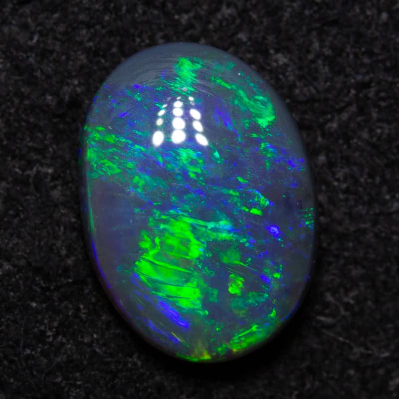 0.75 ct black opal 7.5x5x2.5mm