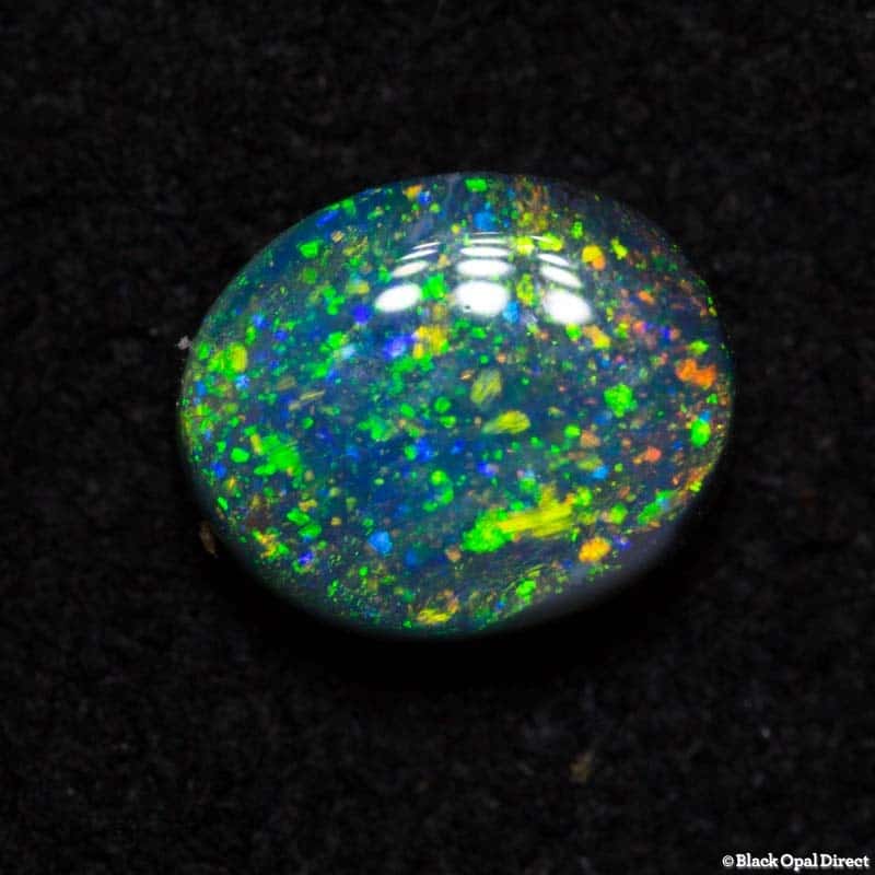 0.77 ct black opal pinfire pattern 6.4x5x3mm
