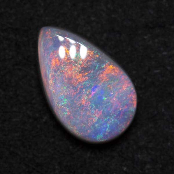0.79 ct dark opal 8.1x5.2x2.7mm