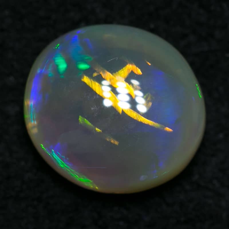 0.80 ct crystal opal 7x6x3mm