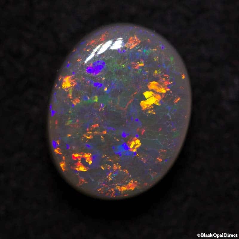 0.80 ct semi black opal 6x5x3mm