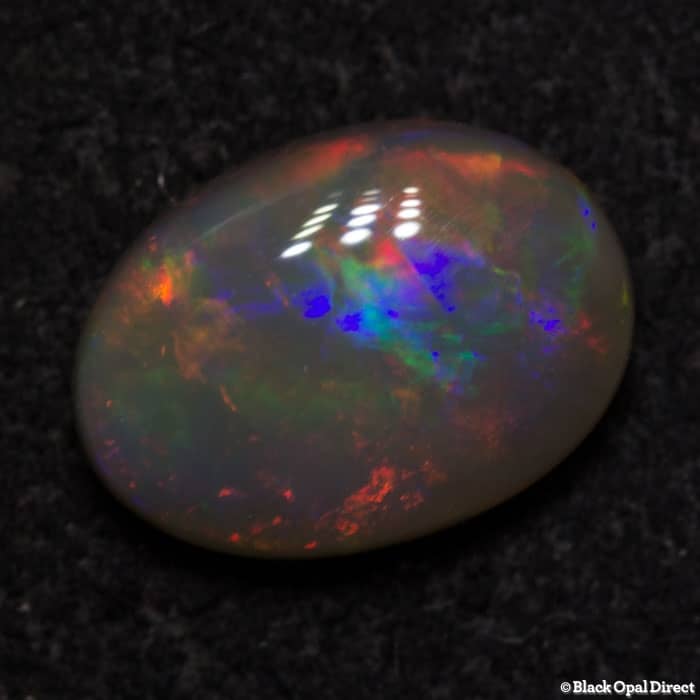 0.80 ct semi black opal 8x5.5x3mm