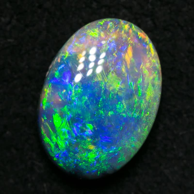 0.82 ct dark opal 8x5.5x3mm