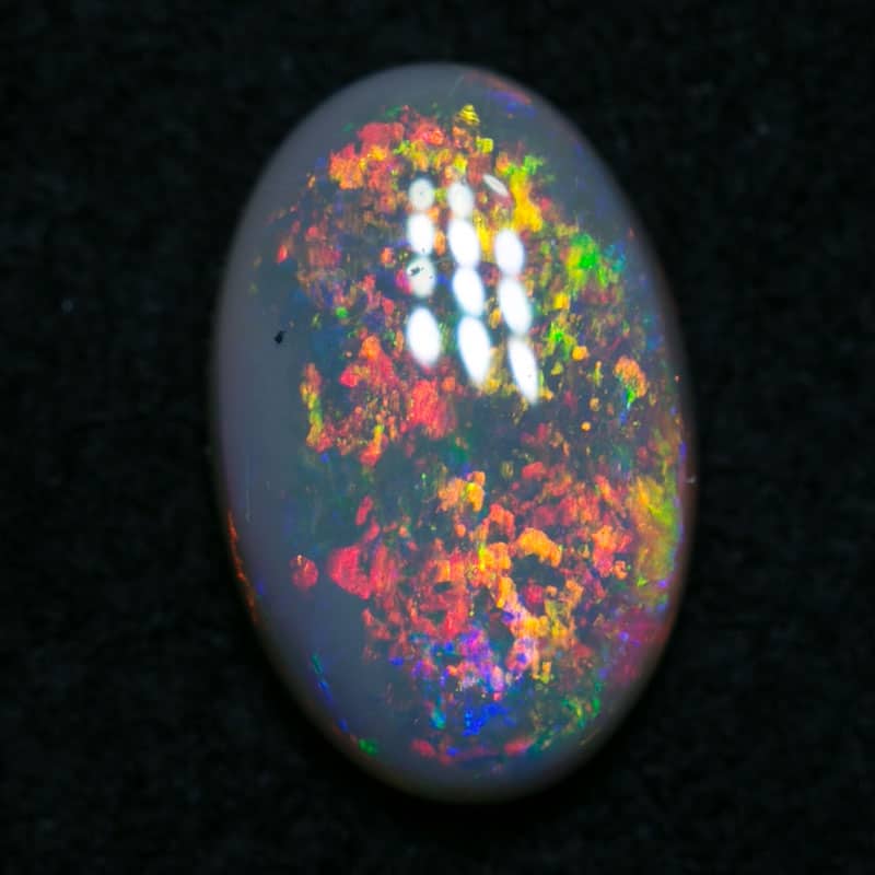0.82 ct dark opal 8x5x2mm