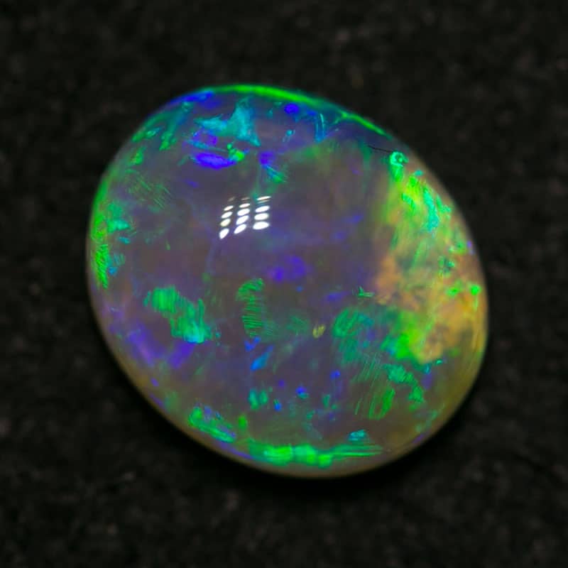 0.83 ct crystal opal 7x6x3mm