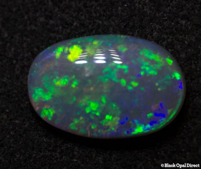 0.86 ct semi black opal 9x6x3
