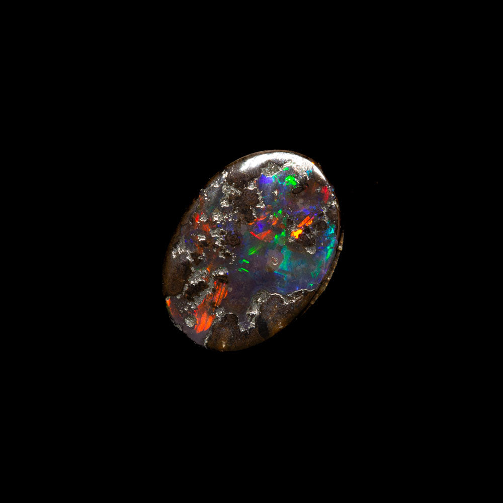 0.87 ct boulder opal 7.6x5.4x2.3mm - Image 2