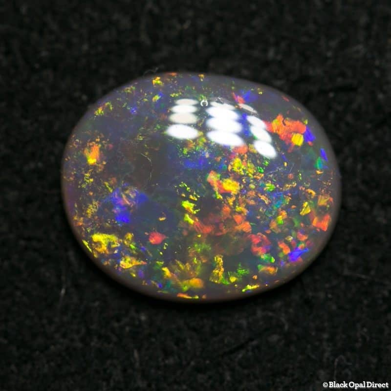 0.88 ct semi black opal 8.5x7x2mm