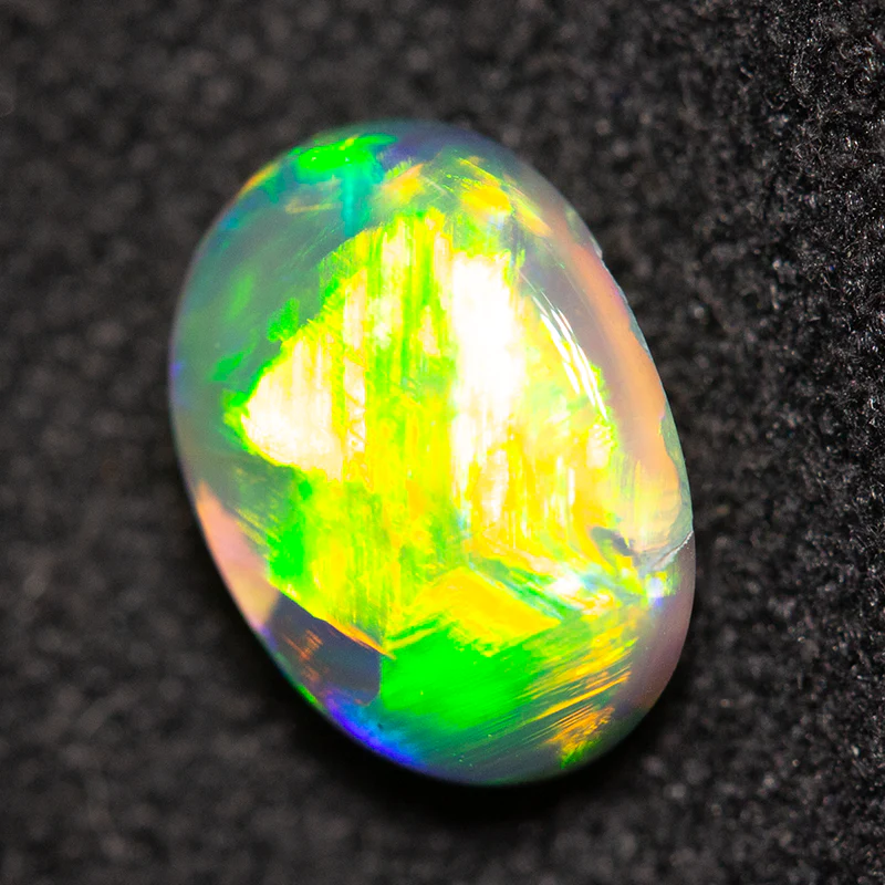 0.90 ct black opal 7.9x5.8x3.2mm