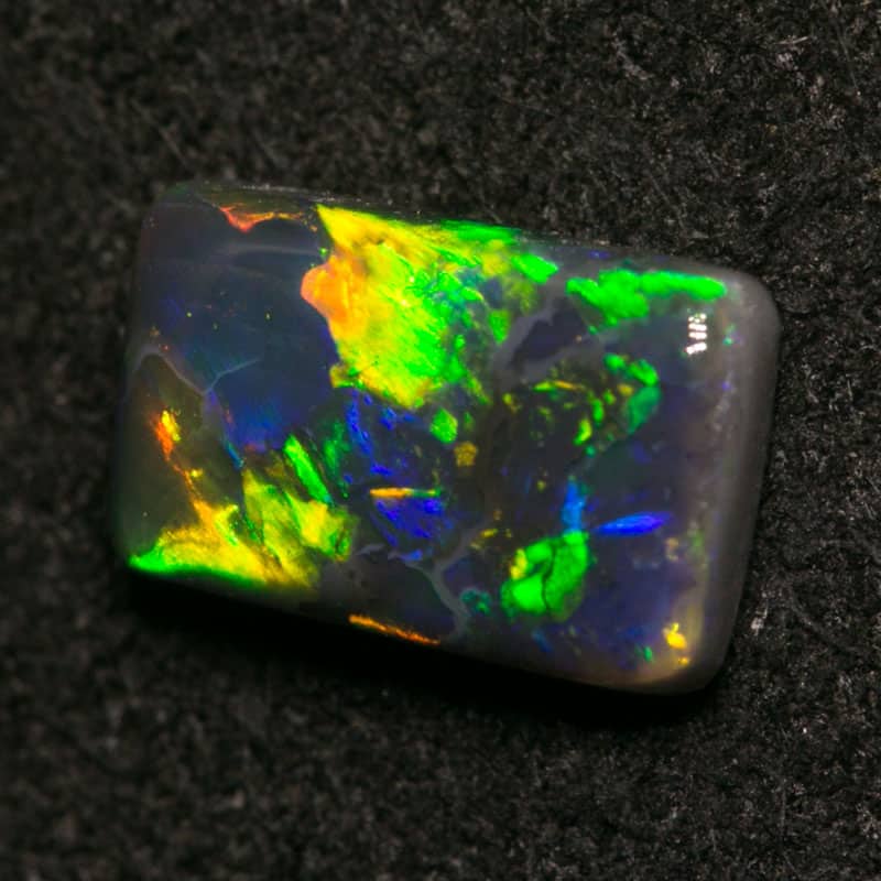 0.91 ct black opal 8x5x2.5mm