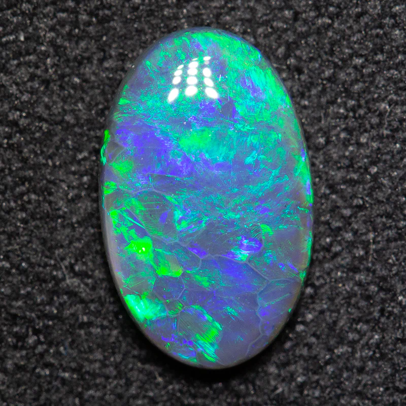0.92 ct black opal 9.4x5.9x2.5mm