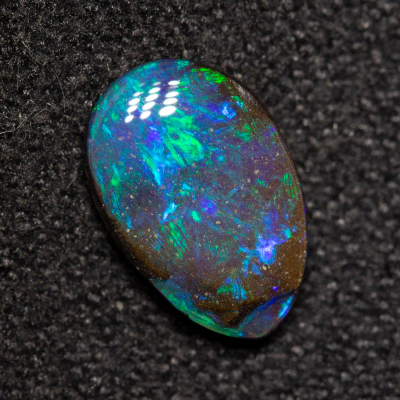 0.94 ct boulder opal 8.4x5.5x2.2mm