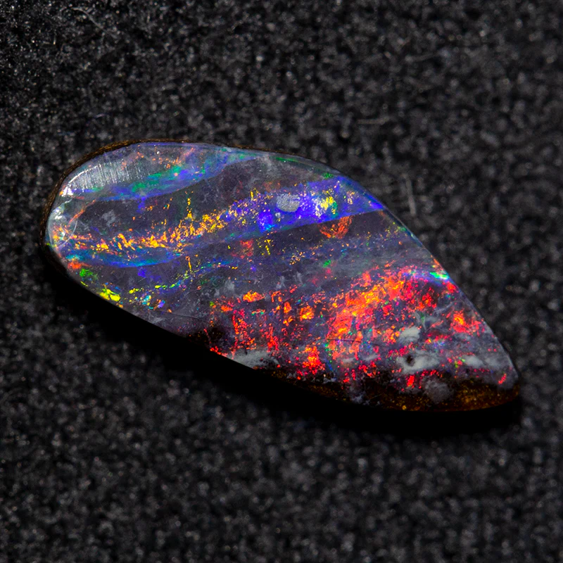 0.97 ct boulder opal 10x4.3x2.2mm