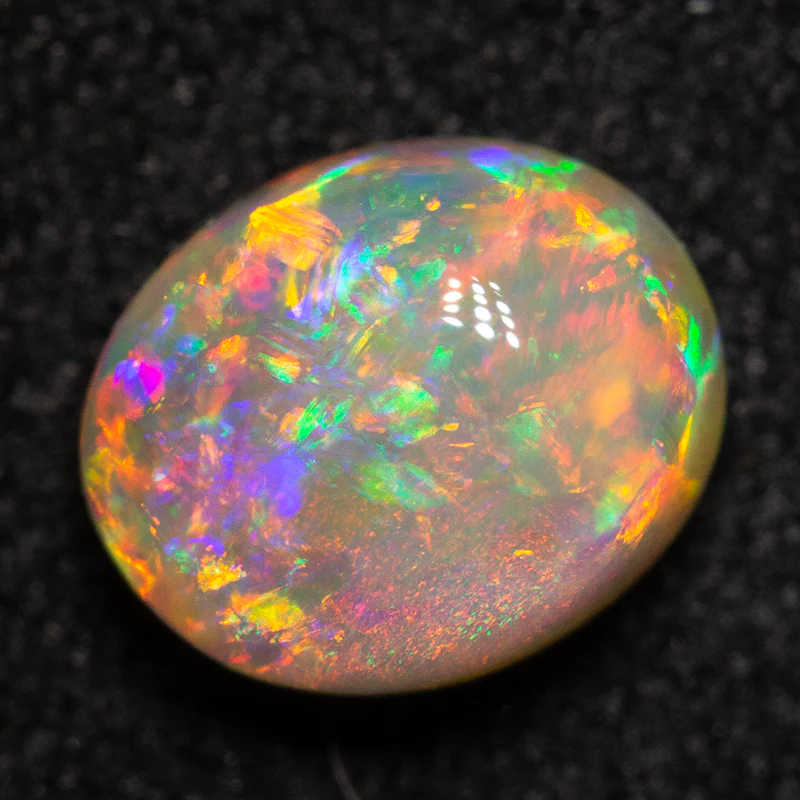 0.97 ct crystal opal 6.9x5.7x4mm