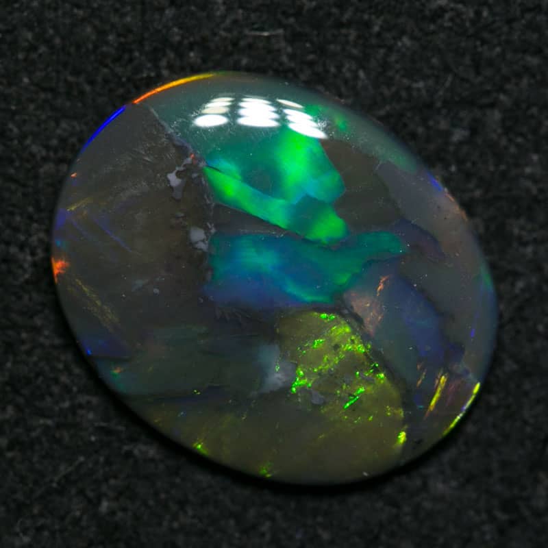 1.00 ct black opal 10x8x2mm