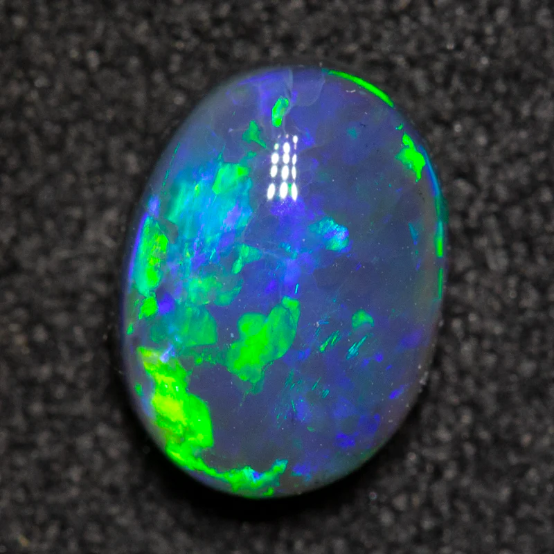 1.00 ct black opal 7.6x5.7x3.7mm