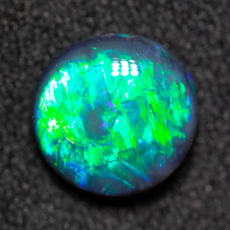 1.03 ct black opal 7x7x3mm