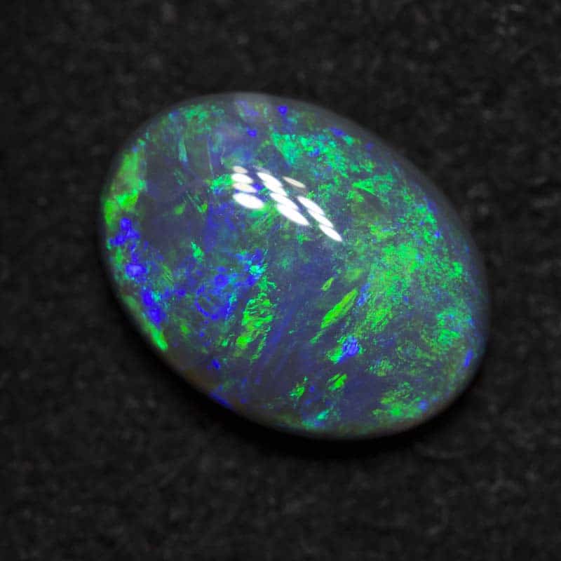 1.03 ct black opal 8.3x6.2x3mm