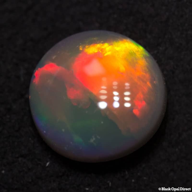 1.09 ct semi black opal 7.7mm round x3mm