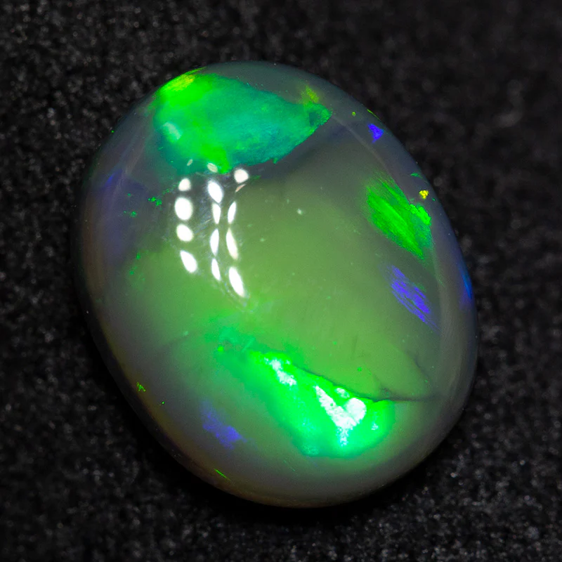 1.26 ct black opal 8x7x3 mm