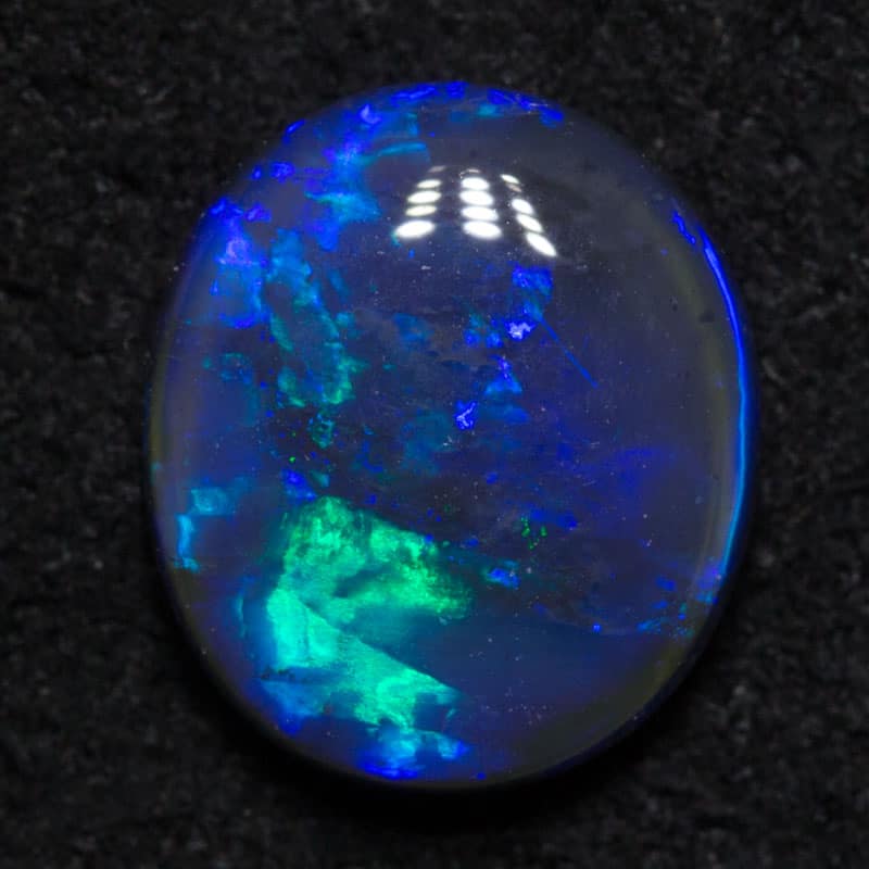 1.29 ct black opal 8.4x7.2x3.2mm